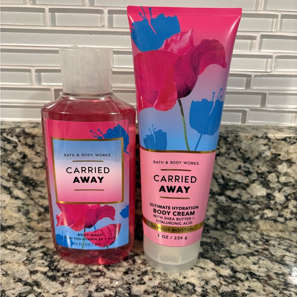 BRAND NEW! Bath and body works Carried Away shower gel and body creme set.
